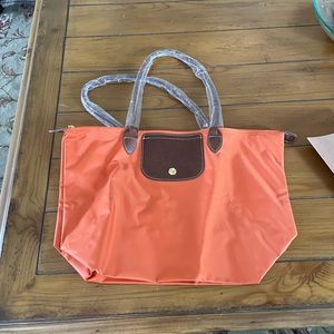Long champ bag orange color